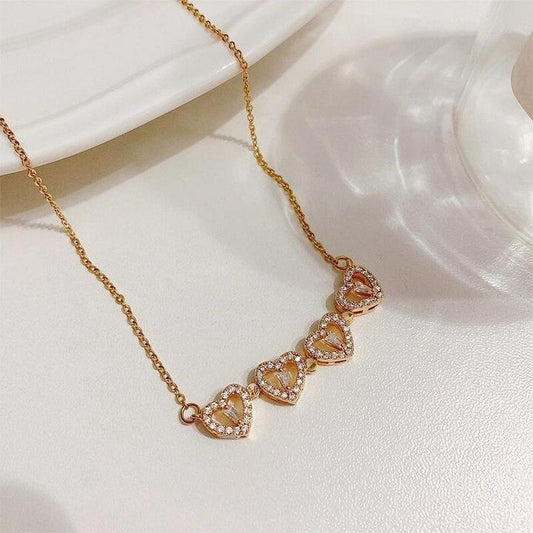 MAGNETIC FOUR HEART NECKLACE